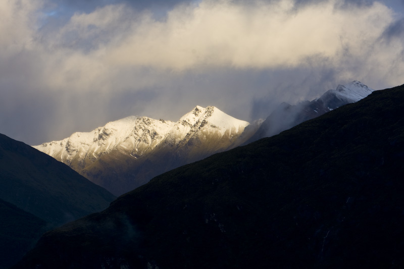 Snow Covered Ridge At Sunset